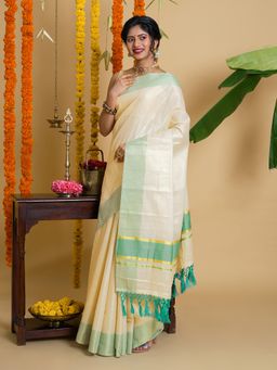 Teejh - Muvatupuzha Kerala Tissue Turquoise Saree with Unstitched Blouse