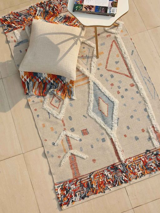 Revive Home Tufted Rug with Abstract Details And Multi-Color Tassel Border