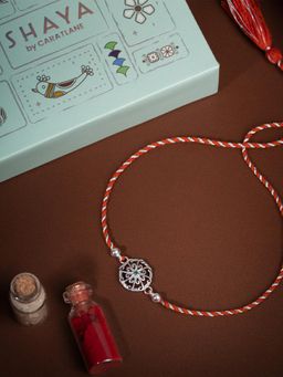 Shaya by CaratLane - Kolam Flower 925 Silver Rakhi