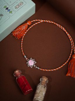 Shaya by CaratLane - Om Pink Flower 925 Silver Rakhi