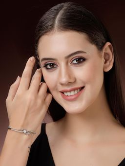 ZENEME - Rhodium Plated White American Diamond Stoned Bangle-Style Charm Bracelet