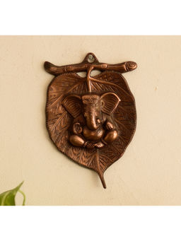 eCraftIndia - Brown Metal Lord Ganesha On Leaf Wall Hanging