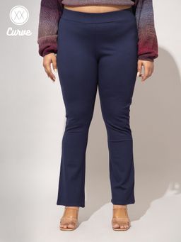 Twenty Dresses by Nykaa Fashion - Curve Navy Blue Solid Basics Flared Jeggings