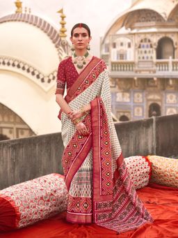 Elora - Off white Poly Viscose Silk Ikkat Printed Patola Saree with Red weaving Border