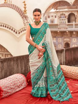 Elora - Off white Poly Viscose Silk Ikkat Printed Patola Saree with Teal weaving Border