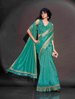 Tikhi Imli - Green Art Silk Saree with Sequence Lace on Woven Border & Tassels with Unstitched Blouse