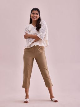 Go Colors - Women Solid Gold Mid Rise Cropped Metallic Pant