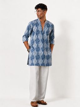 Vastramay - Men Blue Ikkat Print Cotton Kurta with White Wide-Leg Pant Set