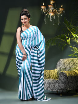 DESH BIDESH - Women Teal Crepe Printed Saree Without Blouse