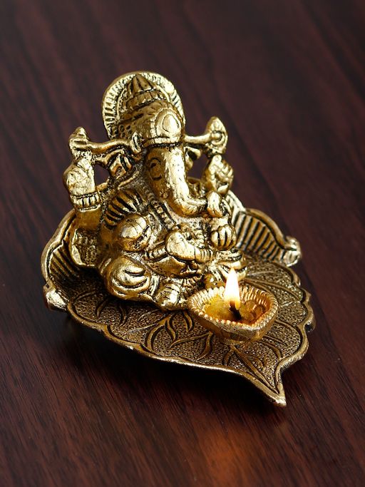 eCraftIndia Golden Metal Handcrafted Lord Ganesha Idol with Diya