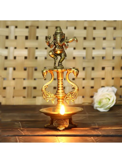 eCraftIndia Golden Diya with Lord Ganesha Idol and Peacock Design Stand