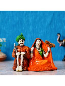 eCraftIndia - Colourful Sitting Rajasthani Couple Handcrafted Statue