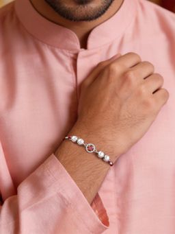 Ornate Jewels - 925 Silver Red Garent Designer Pearl Thread Rakhi With Roli Chawal for Brother