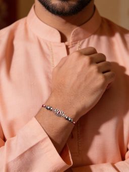 Ornate Jewels - 925 Silver Red Garent Lotus Kamal Thread Rakhi With Roli Chawal for Brother