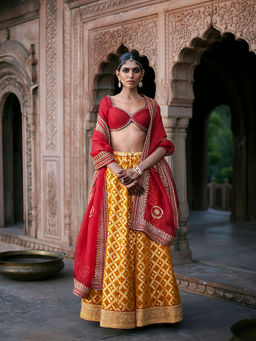 WeaverStory - Yellow Banarasi Lehenga with Red Choli and Dupatta and Yellow Belt (Set of 3)