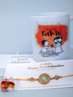 PANASH - Gold-Plated Circular-Shaped Ganesh Ji Thread Rakhi With Mug & Roli Chawal (Set of 4)