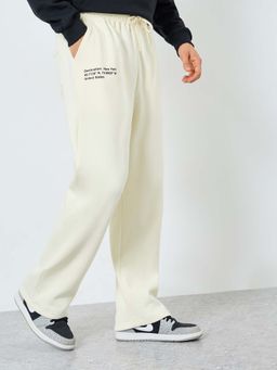Styli - Men Slogan Printed Oversized Open Hem Track Pant - Cream