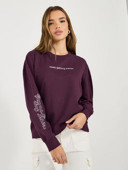 Styli - Women Oversized Fit Slogan Burgundy Sweatshirt