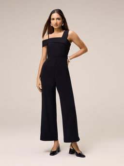 Twenty Dresses by Nykaa Fashion - Black Solid Asymmetric Neck Ankle Length Jumpsuit