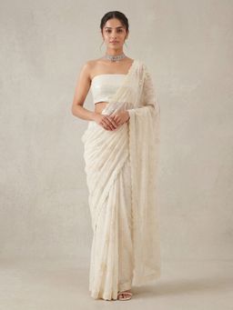 "Two Sisters" by Gyans - Moonlit Bloom White Drape Saree With Unstitched Blouse