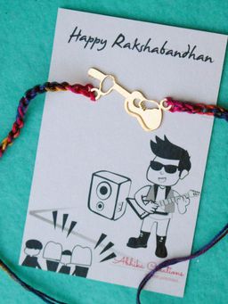 BeAbhika - Guitar Quirky Rakhi with Roli Chawal Capsules