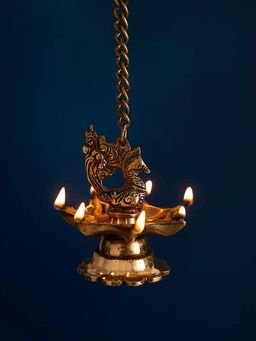 DecorTwist - Brass Peacock Carved Hanging Diya