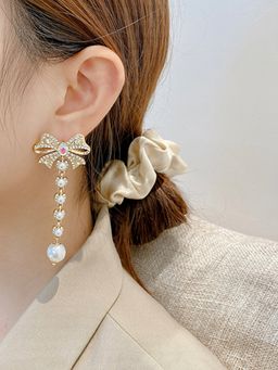 Yellow Chimes - Gold Tone Crystal Studded Bow Knot Shape Pearl Beaded Chain Dangle Earrings