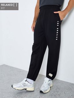 Styli - Men Black Relaxed Fit City Text Thigh Printed Joggers