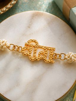 Estele - Gold Plated Veera Rakhi With Sparkling Hindi Motif For Raksha Bandhan