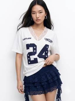 Outzidr - White Lace Inserts V Neck Varsity Graphic Printed T-Shirt