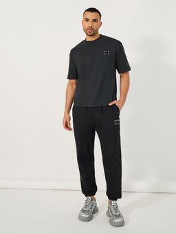 Styli - Men Charcoal Minimal Graphic Mock Neck Oversized Co-Ord (Set of 2)