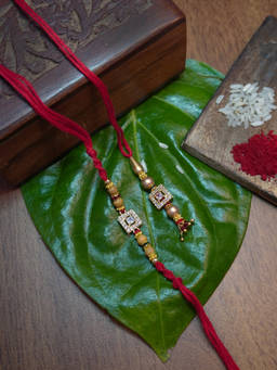 Niscka - Zirconia (CZ) Pair Couple Rakhi for Bhaiya Bhabhi