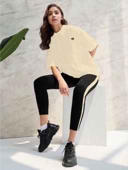 Outzidr - Women Cream Polyester Solid Oversized Fit T-Shirt