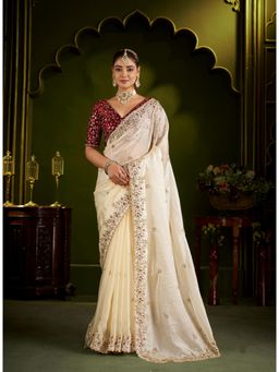 RAAG VARNAM - Beige Satin Silk Saree With Red Embroidered Unstitched Blouse