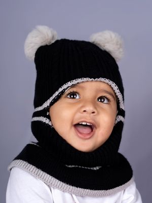 Babyhug Woollen Monkey Cap With Pom Pom Solid Orange- 10.5 cm