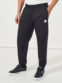 Styli - Men Relaxed Fit Joggers with Seam and Badge Detail