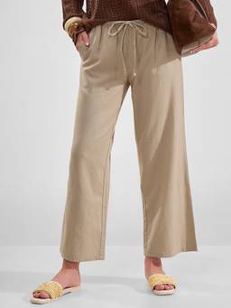 TOKYO TALKIES - Women Beige Solid High Rise Flared Pleated Trouser