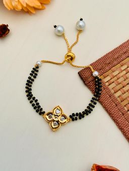 Abdesigns - Gold Plated White Flower Kundan Hand Mangalsutra