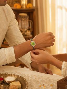 IKI CHIC - Pearl-Embellished Om Green Thread Rakhi