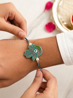 IKI CHIC - Crystal-Studded Hamsa Evil Eye Green Thread Rakhi
