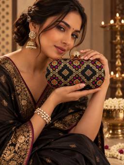 THE TAN CLAN - Mahi Black Oval Clutch
