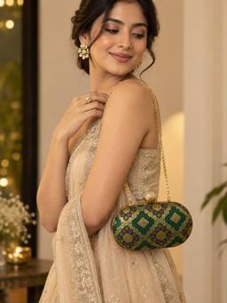 THE TAN CLAN - Mahi Dark Green Oval Clutch