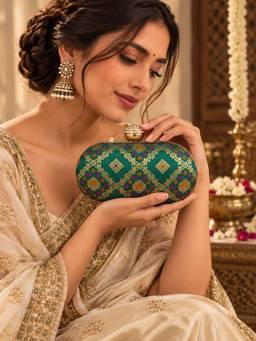THE TAN CLAN - Mahi Light Green Oval Clutch