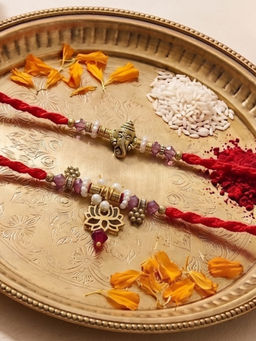 Niscka - Gold Plated Antique Ganesha And Lotus Bhaiya Bhabhi Rakhi Set (Pack of 2)
