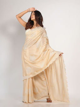 KAVVYA - Women Beige Embroidered Saree