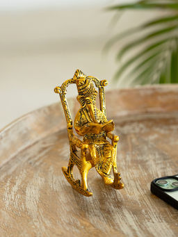 ExclusiveLane - Ganesha On Rocking Chair Idol Showpiece Figurine 5.9 Inches Golden
