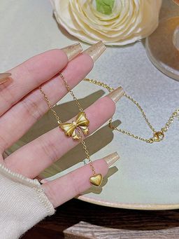 Jewels Galaxy - Gold Plated Stainless Steel Heart Themed Bow Inspired Necklace