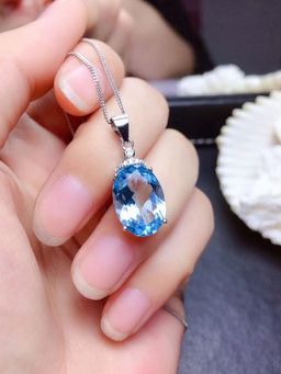 Jewels Galaxy - Silver Plated American Diamond Blue Oval Shape Pendant Necklace