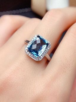 Jewels Galaxy - Silver Plated American Diamond Crushed Ice Cut Blue Rectangular Finger Ring