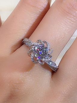 Jewels Galaxy - Silver Plated American Diamond Crushed Ice Cut Twisted Contemporary Finger Ring